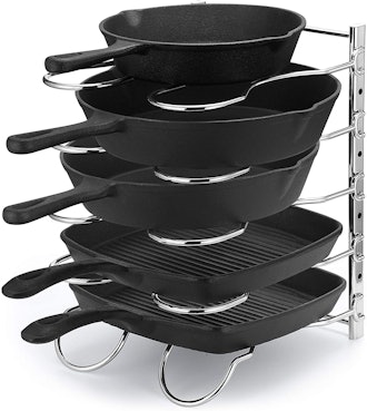 caxxa pan rack holding 5 pans of varying sizes