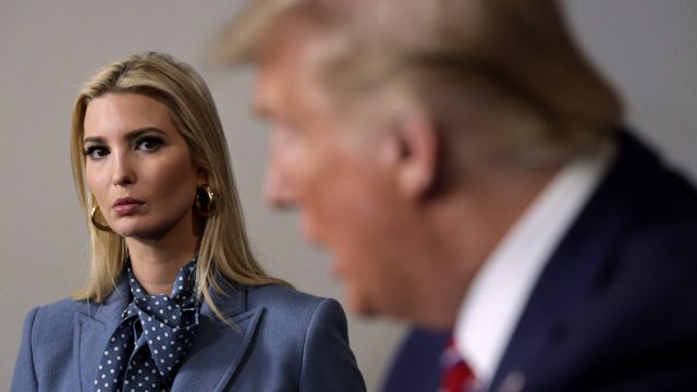 Ivanka Trump sitting down and watching Donald Trump while he is talking.