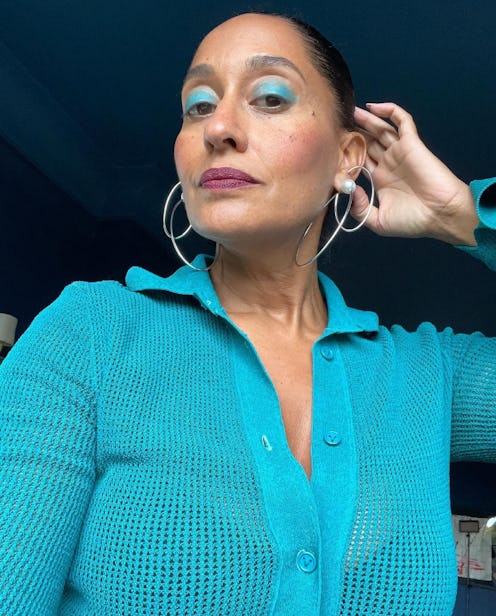 Tracee Ellis Ross bun and blue eyeshadow