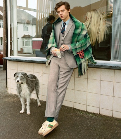 Harry Styles' aesthetic in the 2018 Gucci Tailoring campaign is similar to the Gucci HA HA HA fashio...
