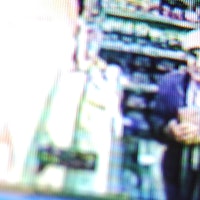 CCTV footage of possible shoplifter.