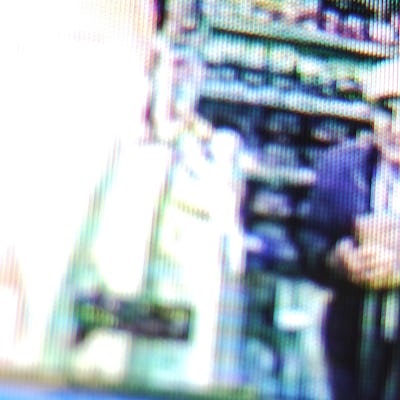 CCTV footage of possible shoplifter.