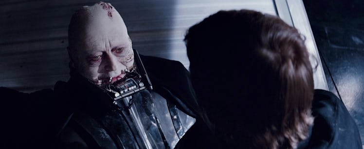An unmasked Anakin Skywalker (Sebastian Shaw) looks up at his son, Luke (Mark Hamill), in Star Wars:...