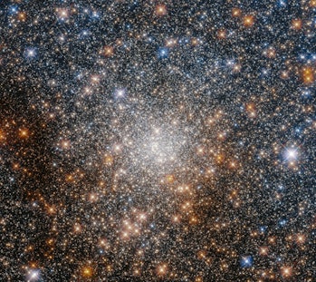 This image shows a dense cluster of bright stars against the darkness of space.