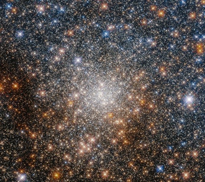 This image from the Hubble Space Telescope shows the dense ball of stars in the center of globular c...