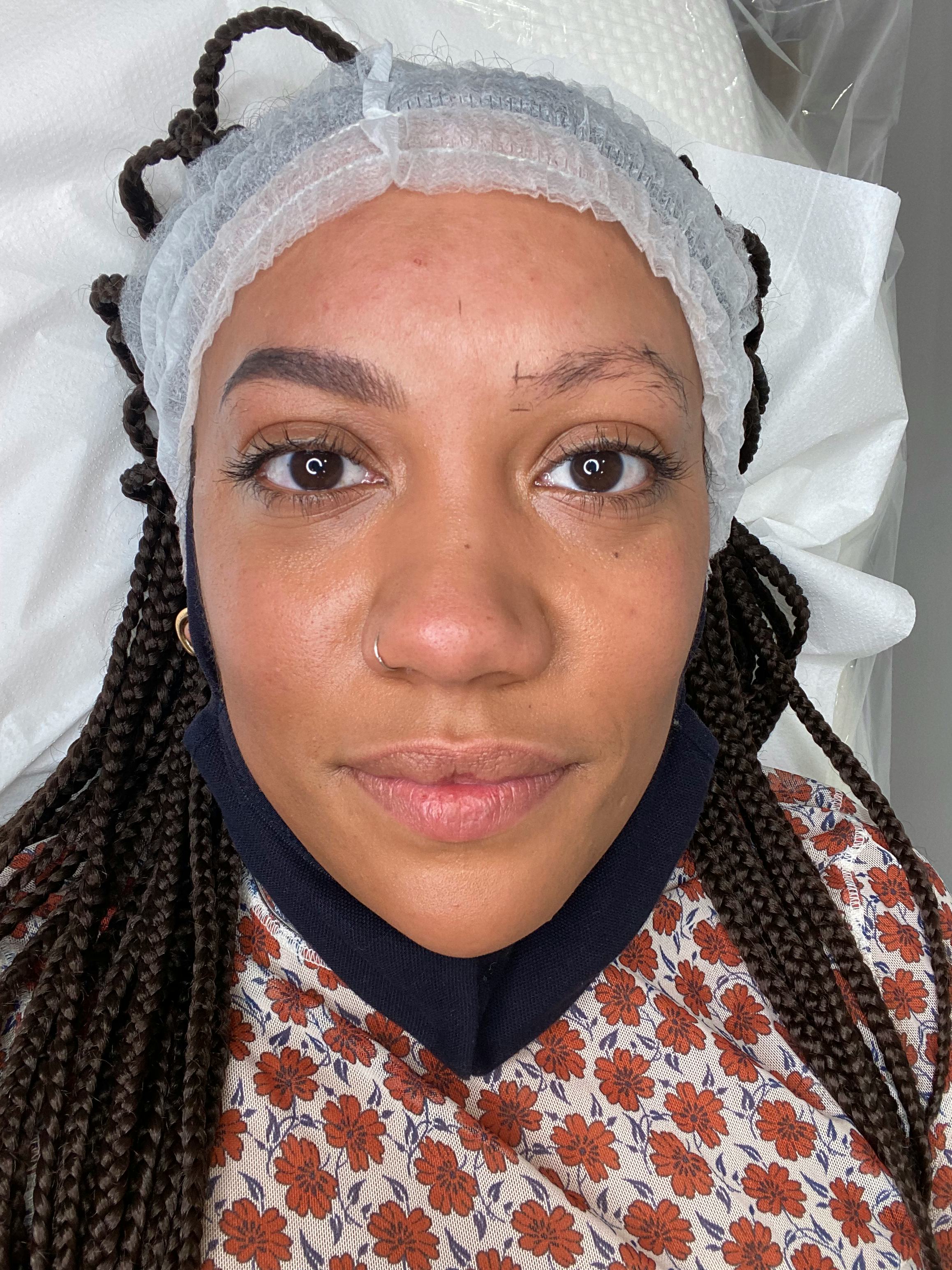 Jessica Morgan showing the eyebrow template.