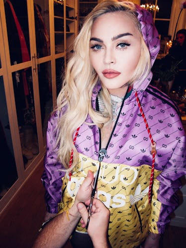Madonna in track jacket.