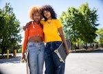 Young pair with their skateboards, having the worst month of July 2022, per their zodiac signs' horo...