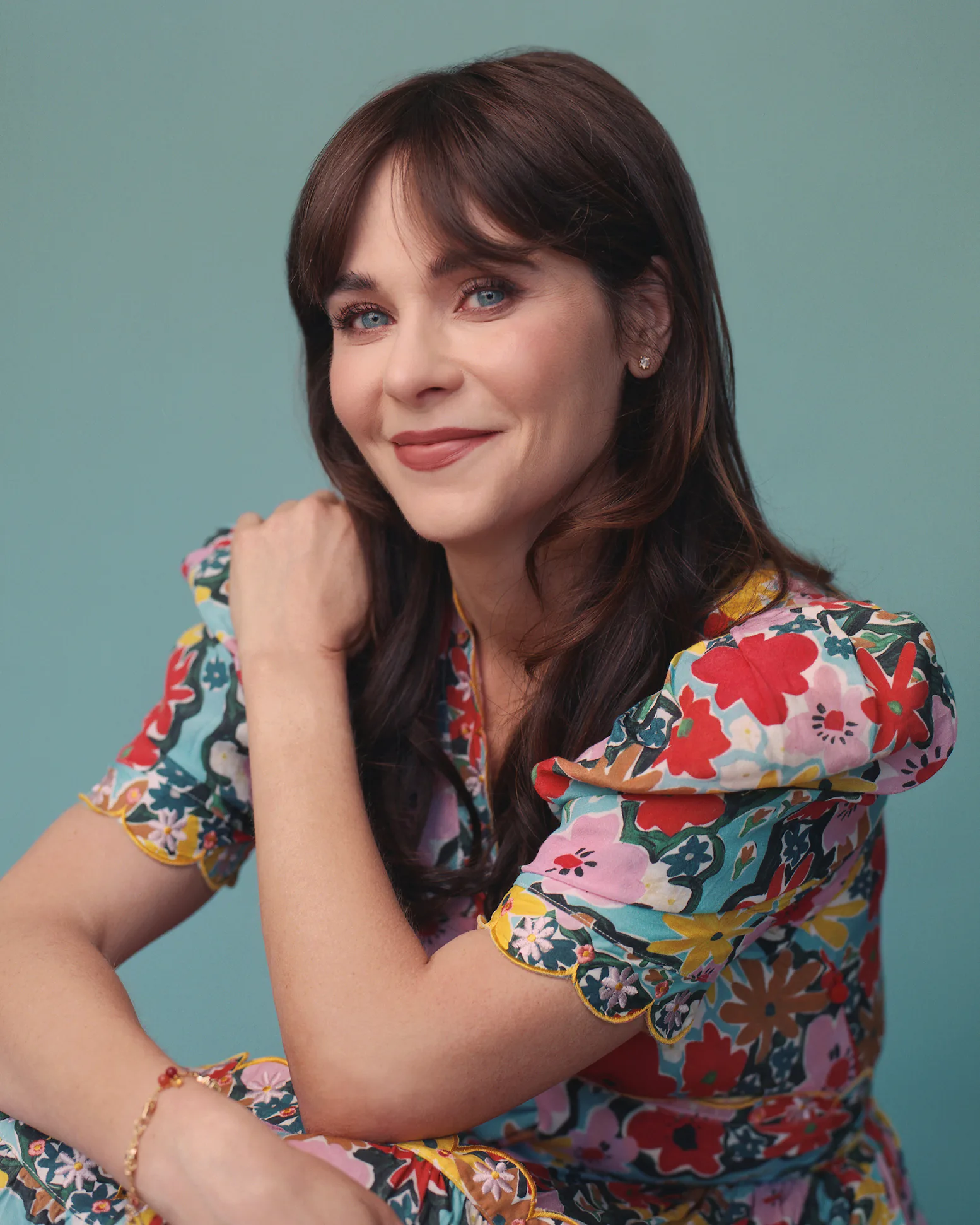 Zooey Deschanel is credited as Bridget in Haunted Hotel Season 2 Actress Zooey Deschanel in a colorful floral dress, the real performer credited as Bridget in Haunted Hotel Season 2