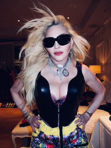 Madonna in sunglasses and bustier.