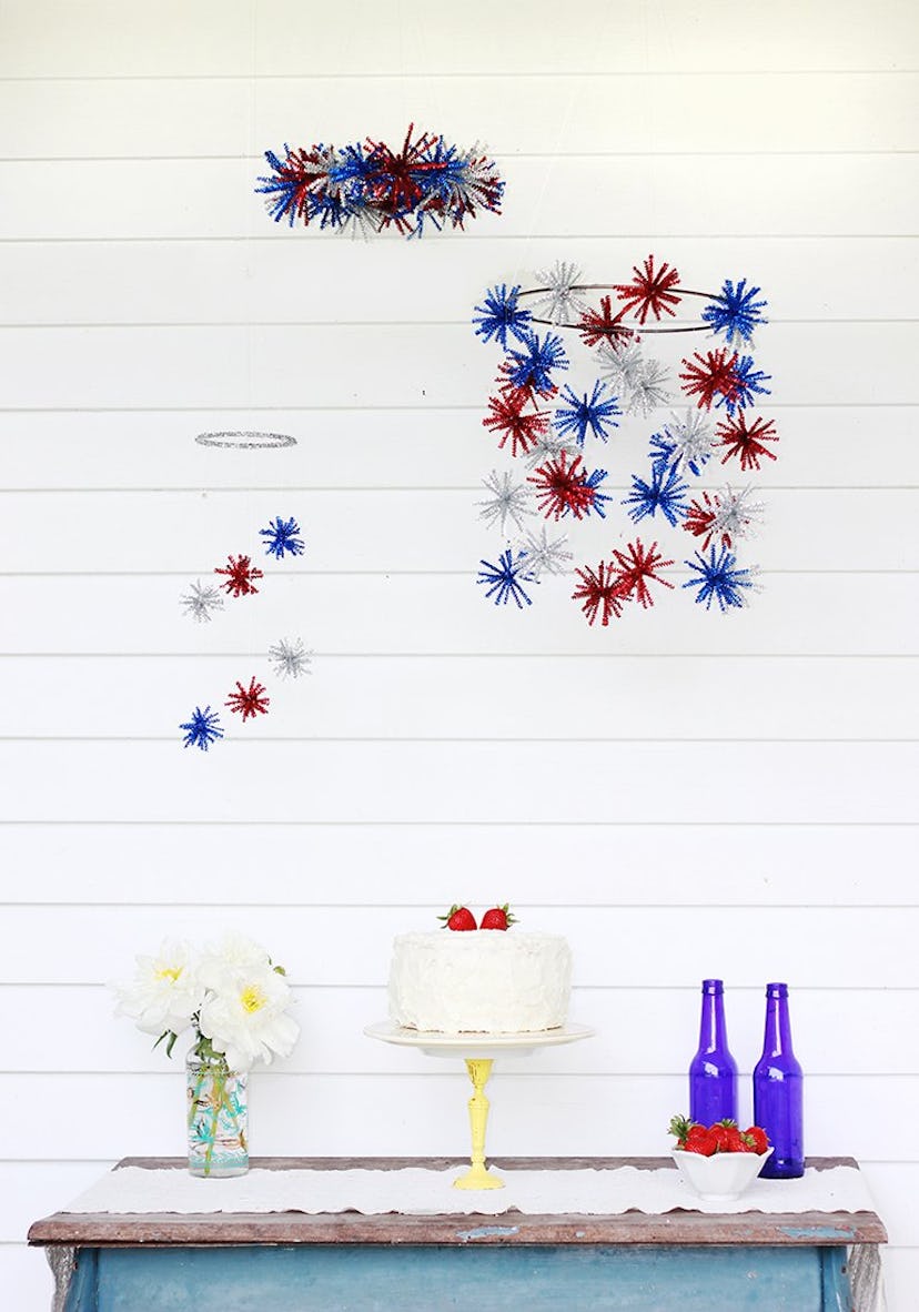 The fourth of July DIY firework pom pom mobile from The Merry Thought