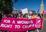 Women march in London against the U.S. Supreme Court's decision to overturn Roe v. Wade