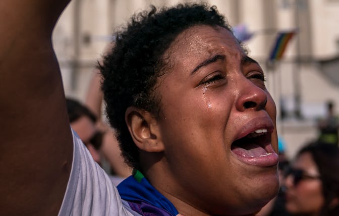 Abortion-rights activist Sierra Frey cries while protesting in front of the Supreme Court on June 26...