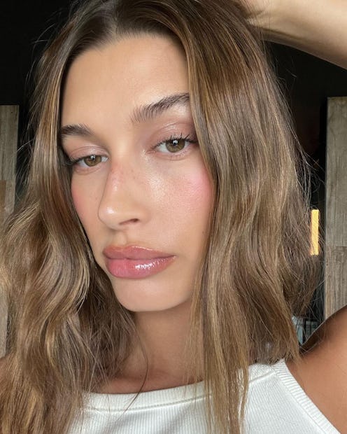The model poses for a quick selfie