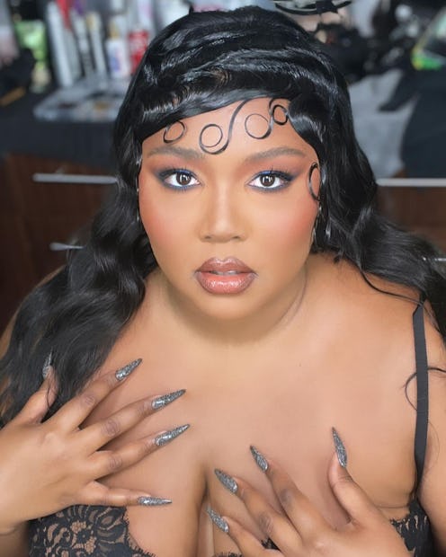 Lizzo rocked glittery stiletto nails at the BET 2022 Awards.