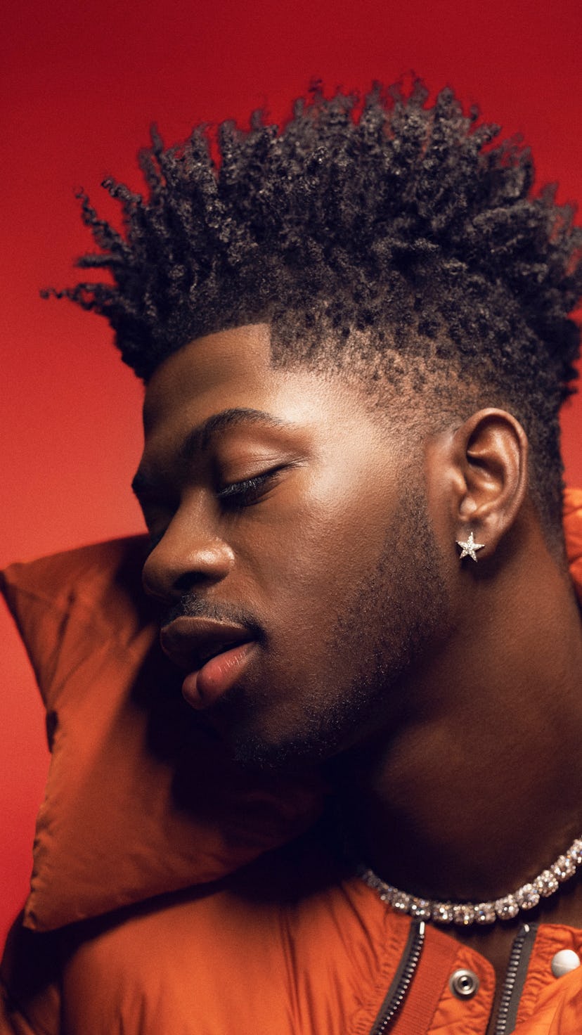 Cover of SOUNDCHECK featuring singer Lil Nas X with a red background and theme