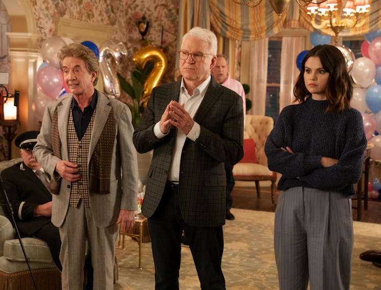 A still from the show 'Only Murders in the Building' highlighting the casts outfits