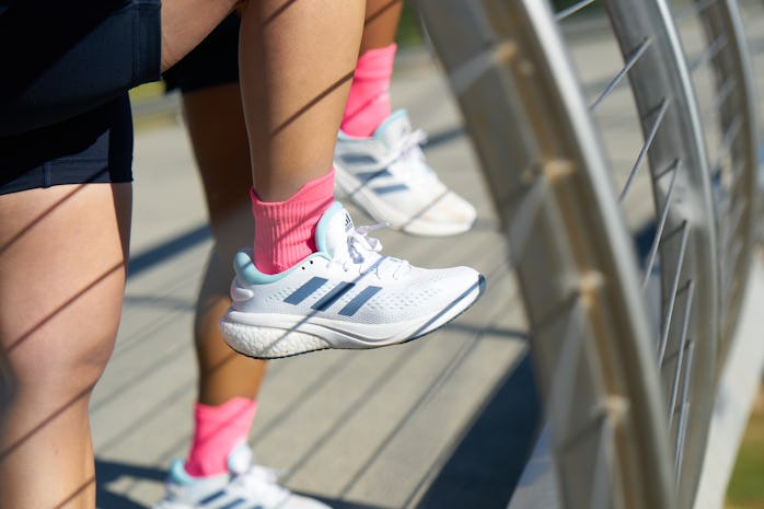 Adidas Supernova sneaker, in light blue and pink, is designed for comfort