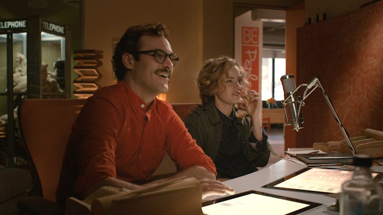 Joaquin Phoenix as Theodore and Amy Adams as Amy in Spike Jonze’s Her