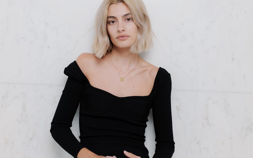 Diana Silvers getting ready for the Celine Homme Summer 2023 runway show.