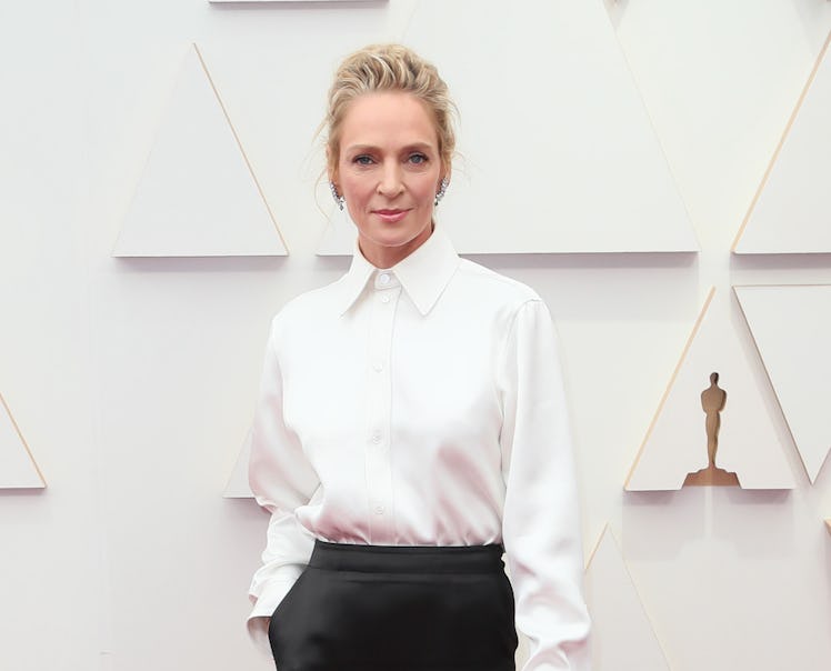 Uma Thurman wearing a white button-down