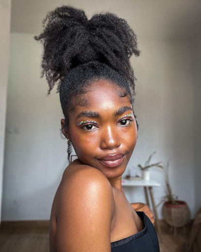 10 Hairstyles For Long Natural Hair To Try This Summer & Beyond