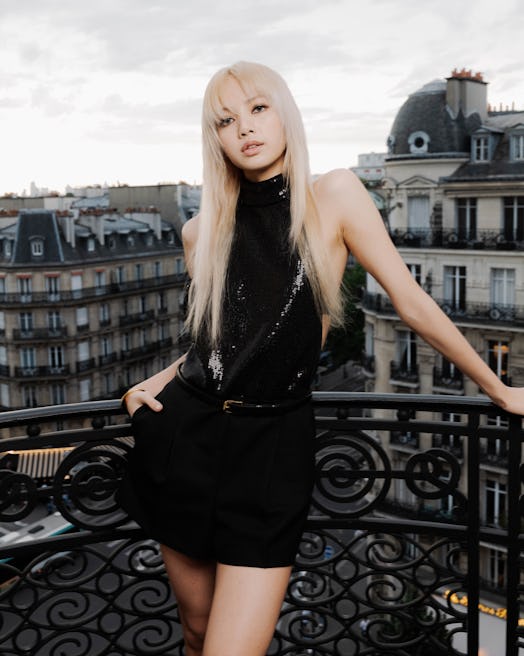 Lisa gets ready for the Celine Homme Summer 2023 show at the Lutetia hotel in Paris on the balcony