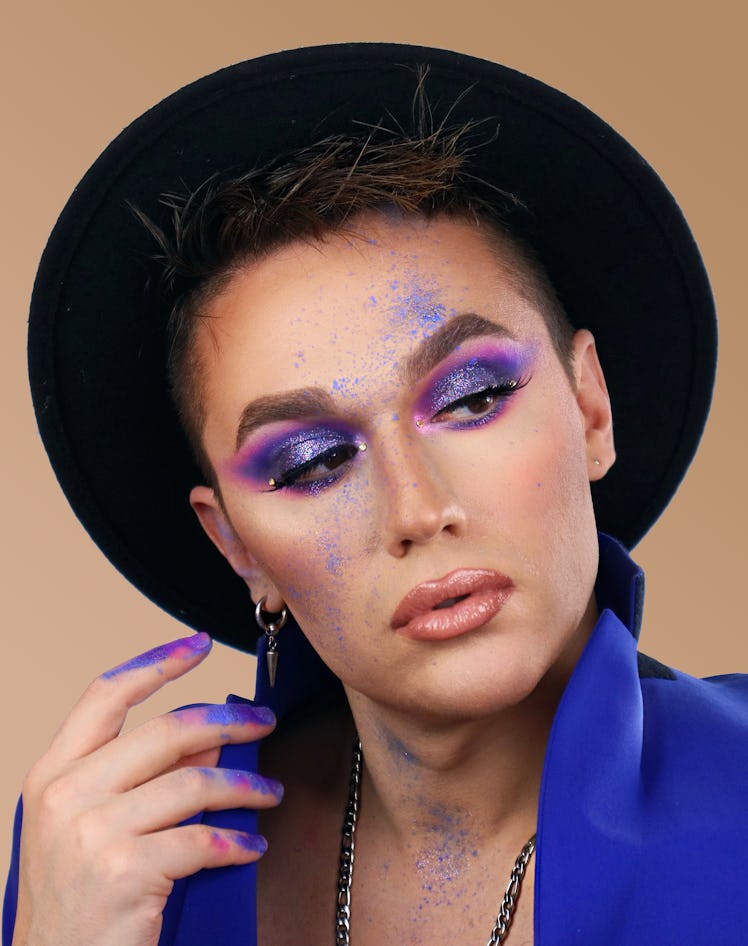 Mr. Johnny Ross wearing makeup as part of Elite Daily's Beauty Court