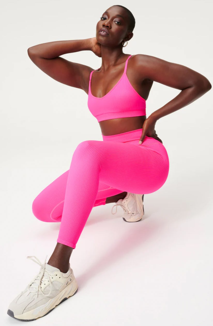 model wearing hot pink seamless chunky rib leggings