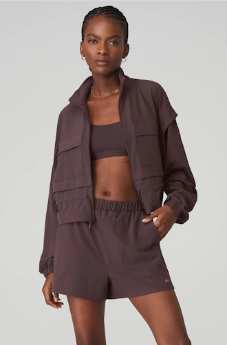 Model wearing ready set jacket from alo yoga