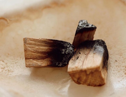 Close up of three used palo santo butts