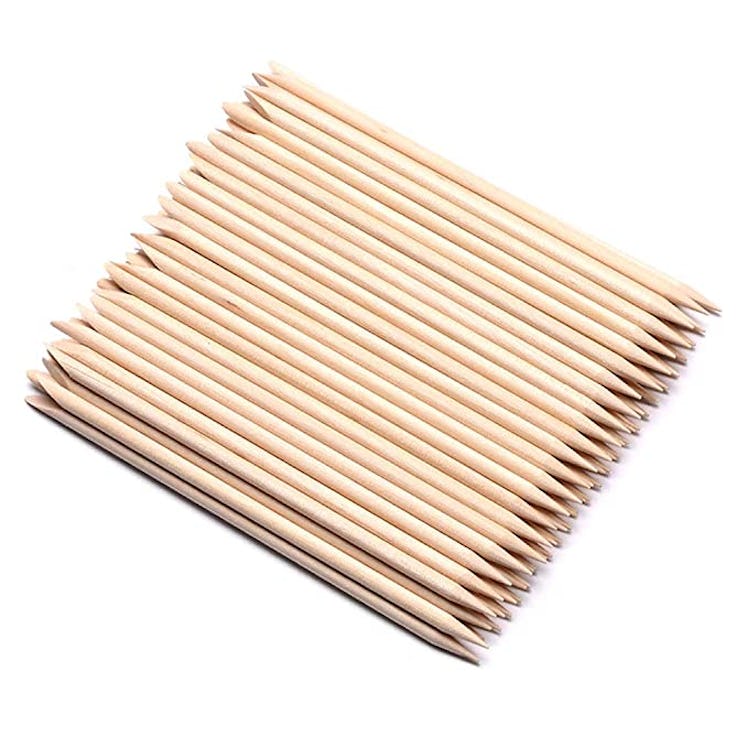 wooden cuticle sticks that make doing your nails at home so easy