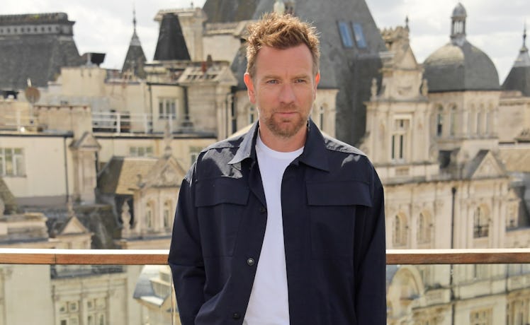 A man wearing a workwear-inspired suit