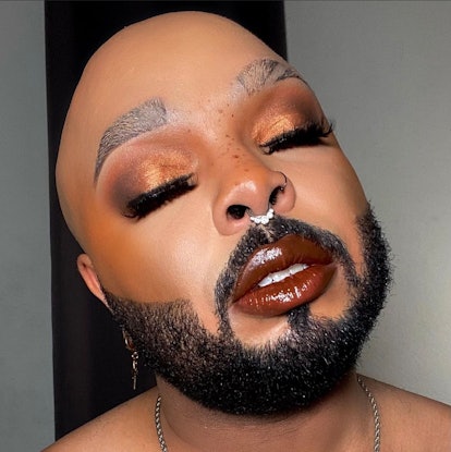 Derrick Davis, a makeup artist and member of Elite Daily's Beauty Court, wears a full glam makeup lo...