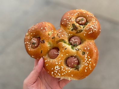 The best Mickey Mouse-shaped snacks at Disney include Mickey hot dog buns, 