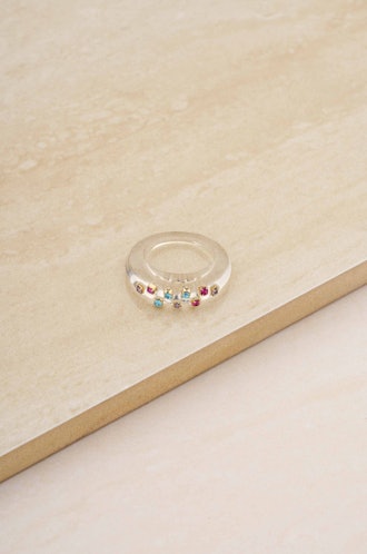 crowd pleaser ring with gold plating and rhinestones