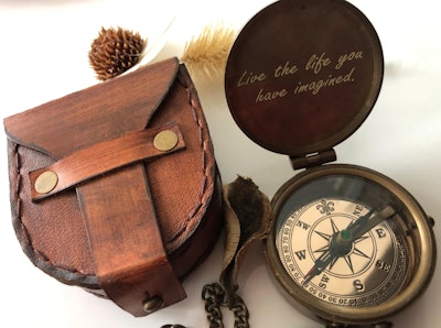 The Vemstore Engraved Compass on Etsy is one of the best Father's Day gifts for sons.