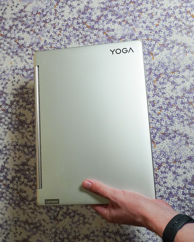 The Yoga 9i closed, with rounded edges visible.