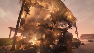 A burning house being demolished in the game Teardown