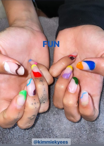 A colorful French-style manicure worn by Bieber.