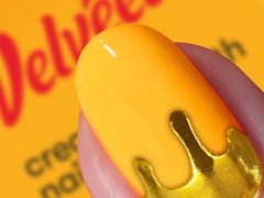 Velveeta & Nails.INC teamed up for a cheese-scented nail polish collection, the first set for the ch...