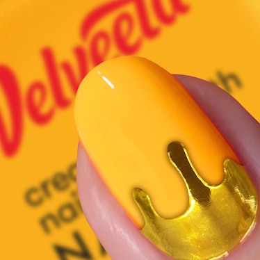 Velveeta & Nails.INC teamed up for a cheese-scented nail polish collection, the first set for the ch...