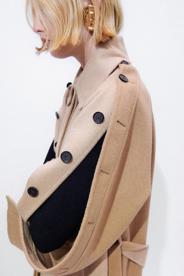 Model in a Proenza Schouler light brown coat