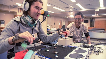 A man using an Xbox controller for disabled people