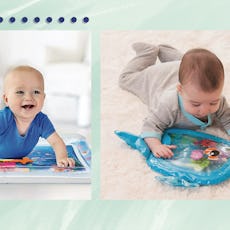 Two babies having lots of fun playing on the tummy water mats 