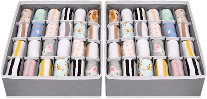 Drawer organizers with small compartments can keep baby clothes neatly folded and sorted.