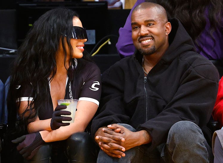 Rapper Kanye West and girlfriend Chaney Jones 