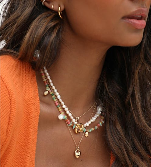 Pearls and colorful pieces are two 2022 jewelry trends
