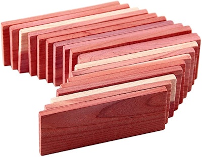 Cedar blocks work better than moth balls for keeping pests away from stored clothing.