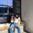 Influencer Aimee Song wearing flared pants